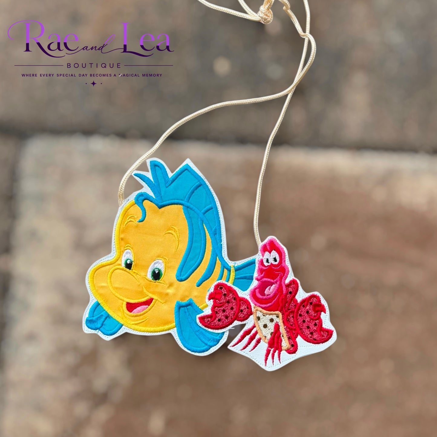 Sebastian and Flounder Flatlay